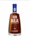 Ron Maja 12 Years Añejo Authentic rum bottle with mahogany liquid and blue foil neck